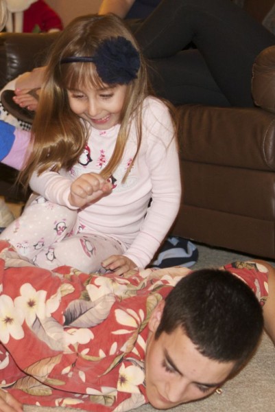 this was afterwards. wrestling with her cousins. I think it made all the adults sick.. but she loved it.. needed it.. 