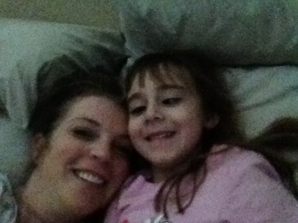 the next morning we laid in bed together.. we videotaped her singing happy birthday to her Daddy and her brothers and sister. 