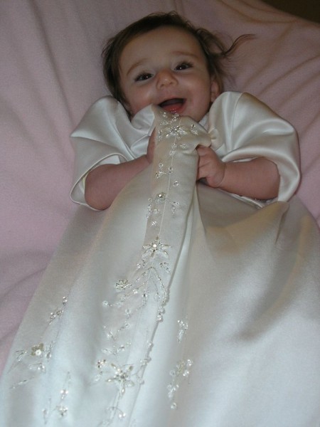 I turned the train of my wedding gown into a christening gown .. 