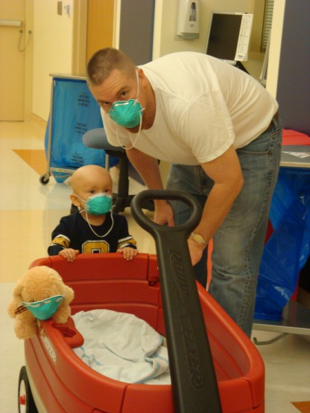 After transplant (restricted to the halls of the oncology unit and had to wear a mask at all times outside his room.. daddy and his trusted doggy always wore a mask with him too).