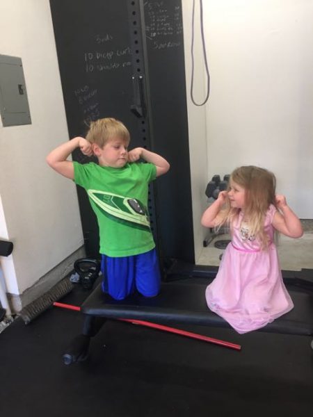 showing off their muscles after working out with me